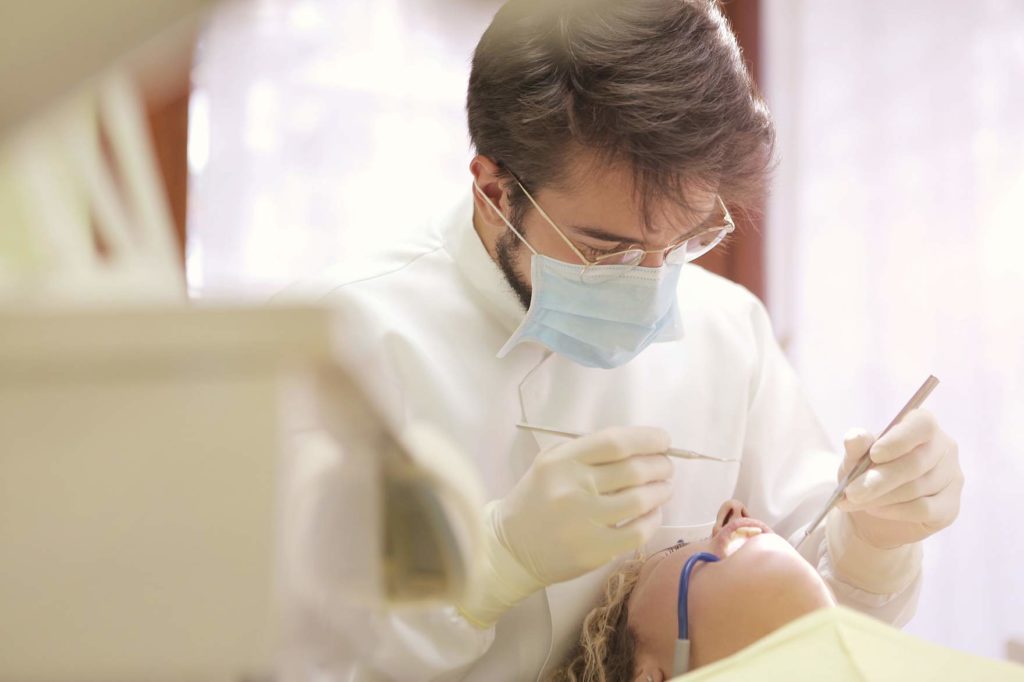 Wisdom tooth extraction is a surgical procedure to remove one or more wisdom teeth